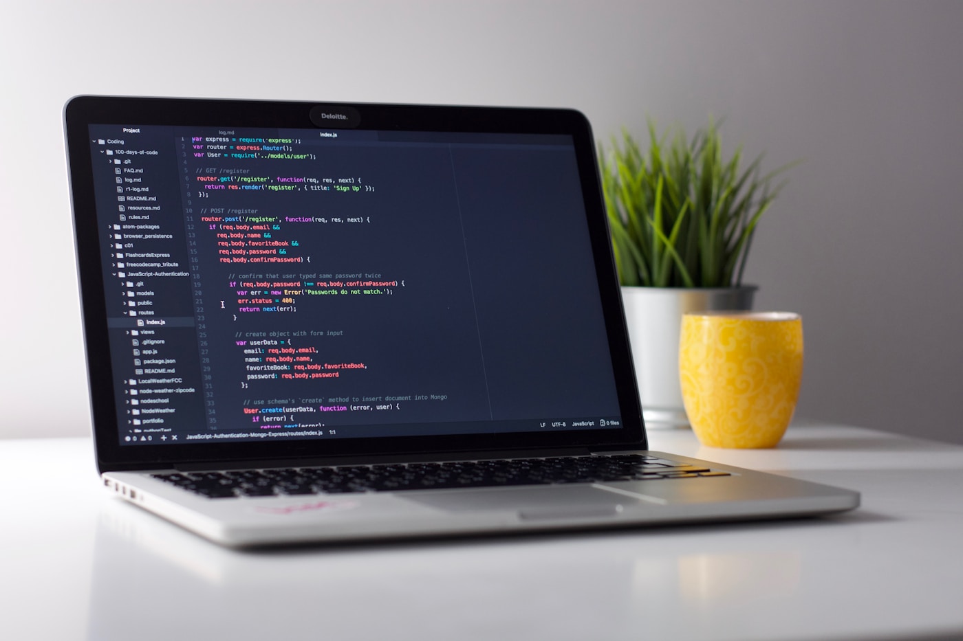 Hands typing code during a technical setup session